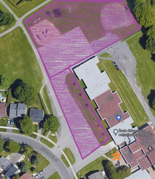 Carte aérienne de l’école indiquant en violet la zone interdite aux parents et une étoile orange marquant le point de dépôt des enfants à pied.